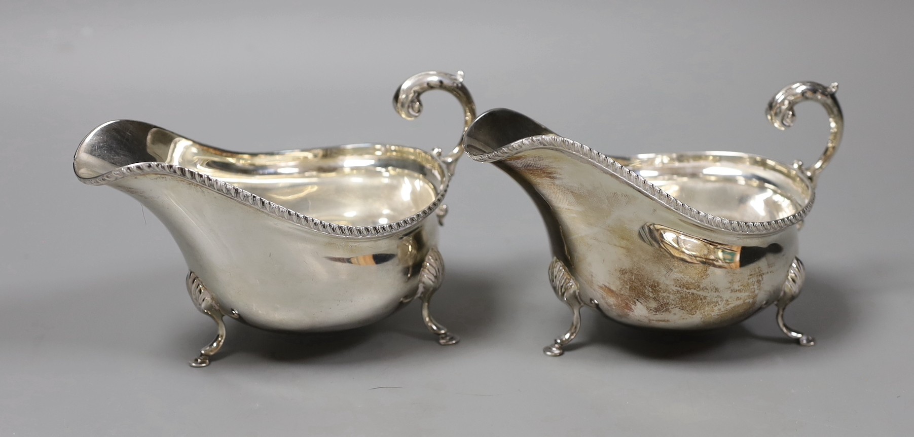 A pair of 1960's silver sauceboats by Garrard & Co, London, 1964, 11.7oz.